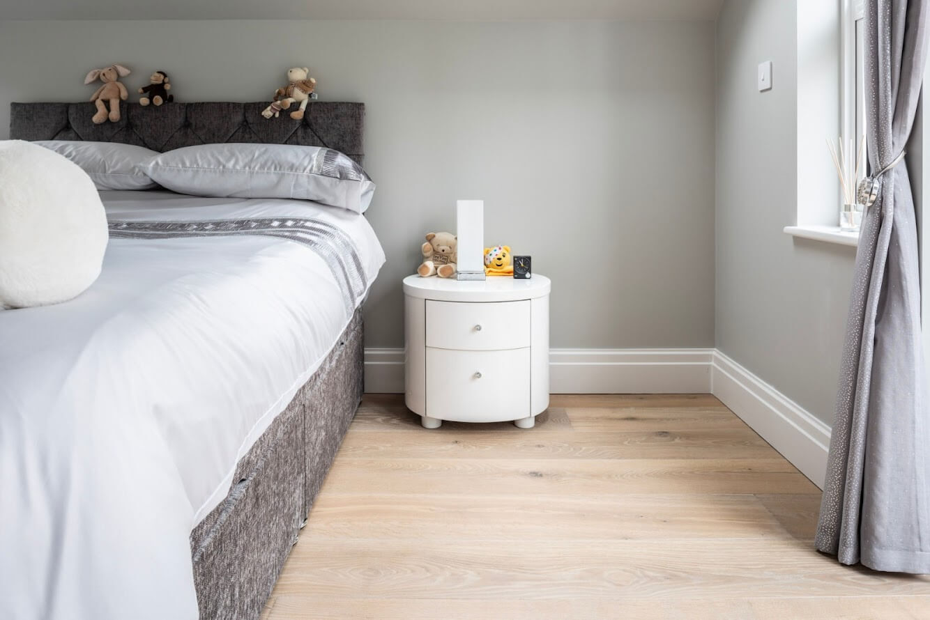 bedroom wood flooring and side table